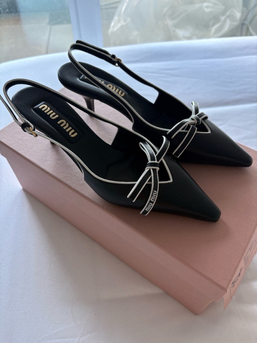 Miu Miu Black Slingback Pointed Toe Pumps with White Trim and Bow